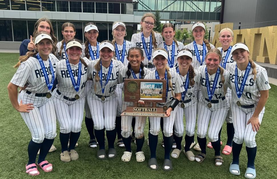 Champlin Park High School softball team pictured with state championship trophy