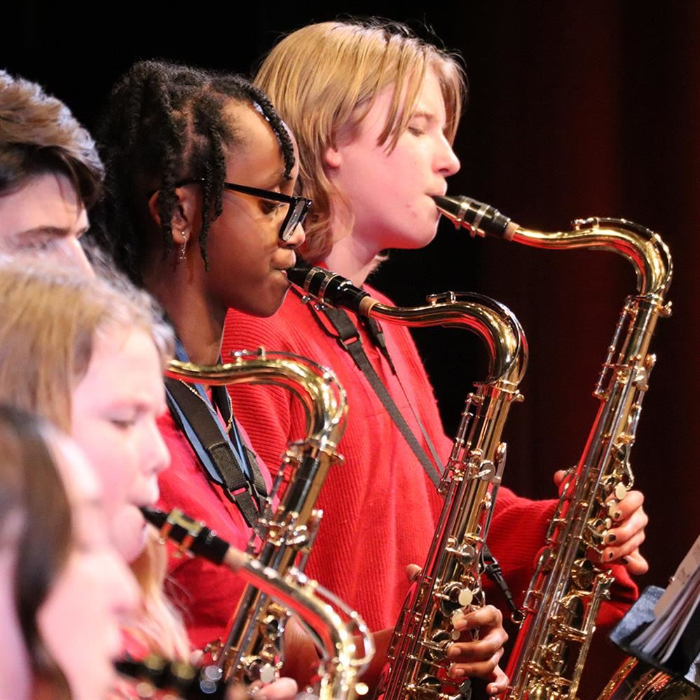  District students performing at a middle school jazz festival