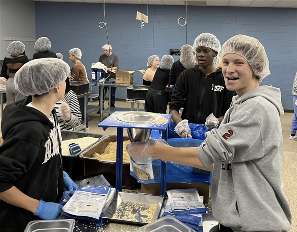 AVID 9th graders pack meals at Feed My Starving Children